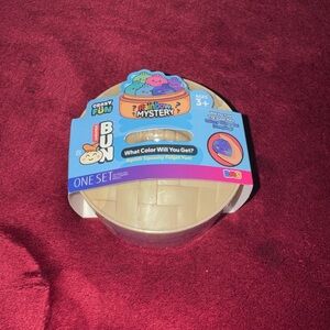 Rainbow Mystery Squish Fidget Bun brand new never opened